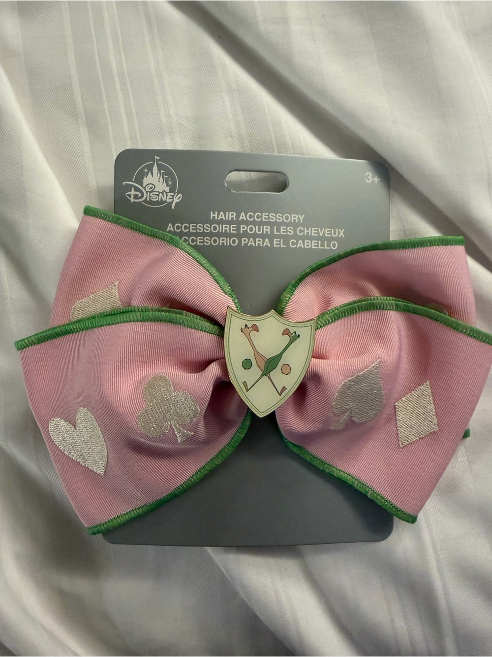 Disney Alice in wonderland Pink & Green Card Hair Bow